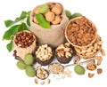 Mixed nuts with leaves of walnut, top view Royalty Free Stock Photo