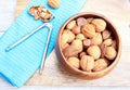 Mixed Nuts and nut cracker and walnut cracked Royalty Free Stock Photo