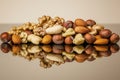 Mixed nuts rolling joyfully on a reflective surface, showcasing a vibrant array of textures and colors. Generative AI