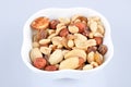Mixed nuts in a white bowl Royalty Free Stock Photo