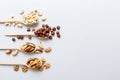 mixed nuts in white wooden spoon. Mix of various nuts on colored background. pistachios, cashews, walnuts, hazelnuts Royalty Free Stock Photo