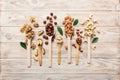 mixed nuts in white wooden spoon. Mix of various nuts on colored background. pistachios, cashews, walnuts, hazelnuts Royalty Free Stock Photo