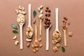 mixed nuts in white wooden spoon. Mix of various nuts on colored background. pistachios, cashews, walnuts, hazelnuts Royalty Free Stock Photo