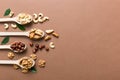 mixed nuts in white wooden spoon. Mix of various nuts on colored background. pistachios, cashews, walnuts, hazelnuts Royalty Free Stock Photo