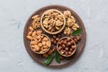 mixed nuts in wooden bowl. Mix of various nuts on colored background. pistachios, cashews, walnuts, hazelnuts, peanuts Royalty Free Stock Photo