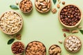 mixed nuts in wooden bowl. Mix of various nuts on colored background. pistachios, cashews, walnuts, hazelnuts, peanuts Royalty Free Stock Photo