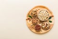 mixed nuts in wooden bowl. Mix of various nuts on colored background. pistachios, cashews, walnuts, hazelnuts, peanuts Royalty Free Stock Photo
