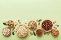 mixed nuts in wooden bowl. Mix of various nuts on colored background. pistachios, cashews, walnuts, hazelnuts, peanuts Royalty Free Stock Photo