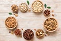 mixed nuts in wooden bowl. Mix of various nuts on colored background. pistachios, cashews, walnuts, hazelnuts, peanuts Royalty Free Stock Photo