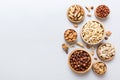 mixed nuts in wooden bowl. Mix of various nuts on colored background. pistachios, cashews, walnuts, hazelnuts, peanuts Royalty Free Stock Photo