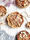 Mixed nuts in a wooden bowls