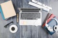 Wooden table top with office items and devices Royalty Free Stock Photo