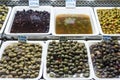 Mixed olive snacks in market display trays barcelona spain