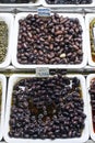 Mixed olive snacks in market display trays barcelona spain