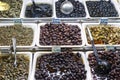 Mixed olive snacks in market display trays barcelona spain