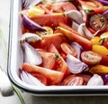 Mixed onions and tomatoes in a tray Royalty Free Stock Photo