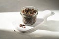 Mixed pepper corn. Black, red and white peppercorns in a glass jar. Royalty Free Stock Photo