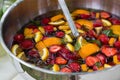 Mixed punch with fruits in metal bowl Royalty Free Stock Photo