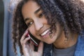 Mixed Race African American Girl Teenager on Cell Phone Royalty Free Stock Photo