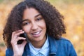 Mixed Race African American Girl Teenager on Cell Phone Royalty Free Stock Photo