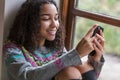 Mixed Race African American Girl Teenager on Cell Phone Royalty Free Stock Photo