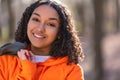 Mixed Race African American Girl Teenager Smiling Laughing in Evening Sunshine Royalty Free Stock Photo