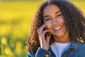 Mixed Race African American Girl Teenager Talking on Cell Phone Royalty Free Stock Photo