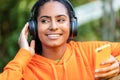 Mixed Race African American Girl Young Woman Teenager Wireless Headphones Cell Phone Royalty Free Stock Photo