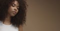 Mixed race black woman portrait with big afro hair, curly hair Royalty Free Stock Photo