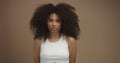 Mixed race black woman portrait with big afro hair, curly hair