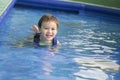 Mixed Race Boy Having Fun at the Water Park Royalty Free Stock Photo