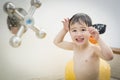 Mixed Race Boy Having Fun at the Water Park Royalty Free Stock Photo