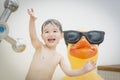 Mixed Race Boy Having Fun at the Water Park Royalty Free Stock Photo