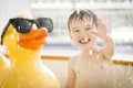 Mixed Race Boy Having Fun at the Water Park Royalty Free Stock Photo