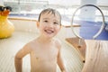 Mixed Race Boy Having Fun at the Water Park Royalty Free Stock Photo