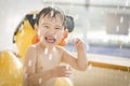 Mixed Race Boy Having Fun at the Water Park Royalty Free Stock Photo