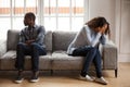 Stressed black couple ignore each other after fight Royalty Free Stock Photo