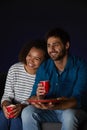 Mixed-Race Couple Enjoying Movie Royalty Free Stock Photo