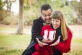 Mixed Race Couple Sharing Christmas or Valentines Day Gifts Royalty Free Stock Photo