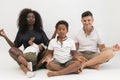 Mixed race family meditation relaxing with yoga. Balanced life c