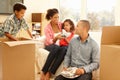 Mixed race family in new home Royalty Free Stock Photo