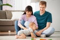 Happy mixed race family with baby son at home Royalty Free Stock Photo