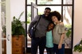 Mixed race family returning home Royalty Free Stock Photo