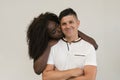 Mixed race family. Young tender wife hugging his husband. Loving Royalty Free Stock Photo