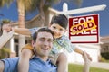 Mixed Race Father, Son Piggyback, Front of House, Sold Sign Royalty Free Stock Photo