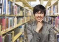 Mixed Race Girl Looking to the Side in the Library Royalty Free Stock Photo