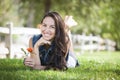 Mixed Race Girl Portrait Laying in Grass