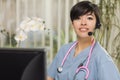 Mixed Race Nurse Practitioner or Doctor at Computer Royalty Free Stock Photo