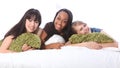 Mixed race teenage girl friends at slumber party Royalty Free Stock Photo
