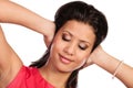 Mixed race woman closing ears with hands. Royalty Free Stock Photo